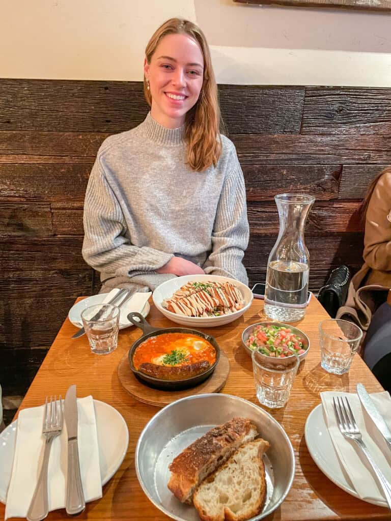 shakshuka and schnitzel salad at 12 chairs cafe brunch in west village nyc